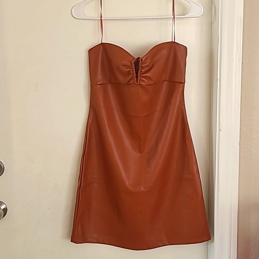 Faux leather mini dress. NEW WITH TAG